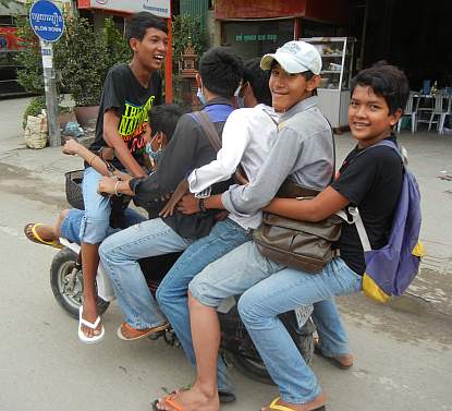 Six teenagers on a motorcycle